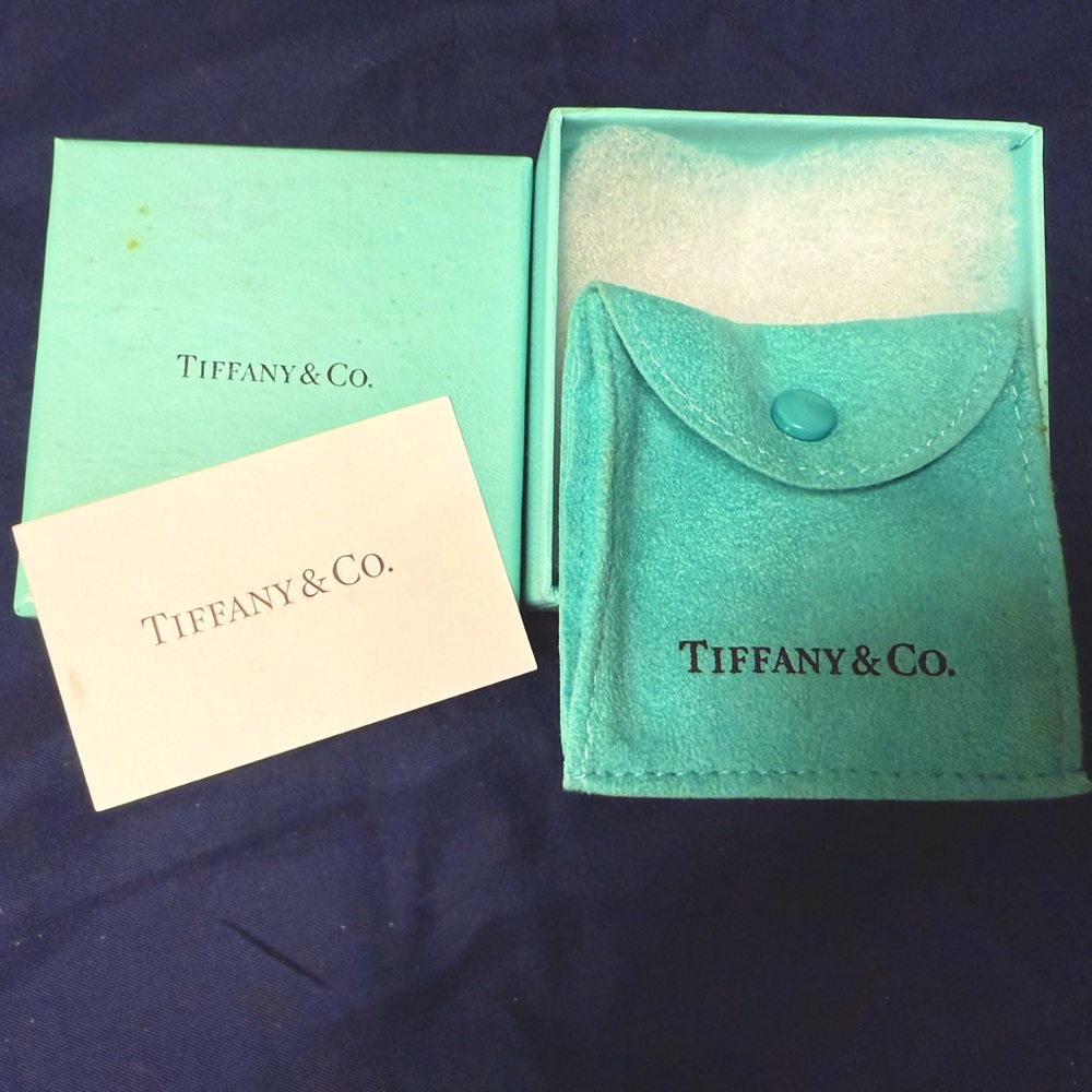 Real Tiffany & Co blue box with original signature pouch and Tiffany's care card